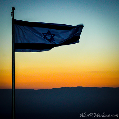 The Israeli Flag on Masada before sunrise